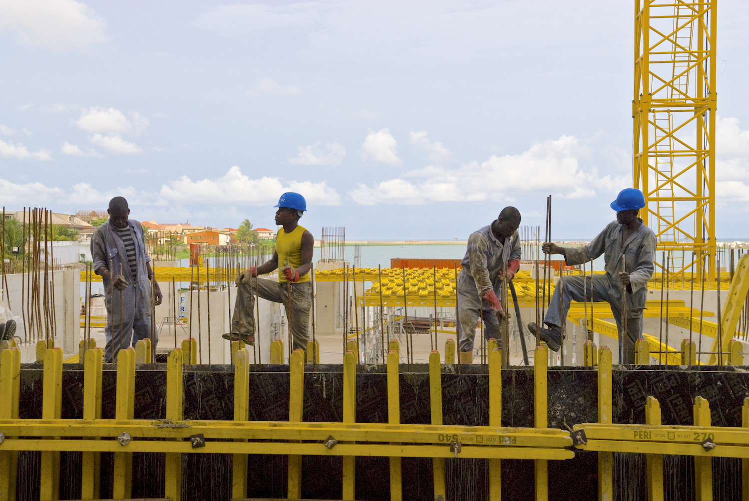 Four construction workers at work