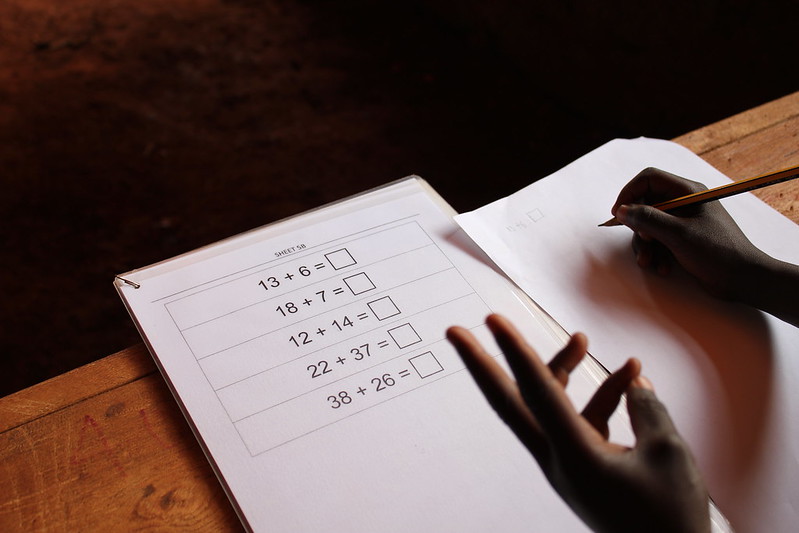 Student counting by hand