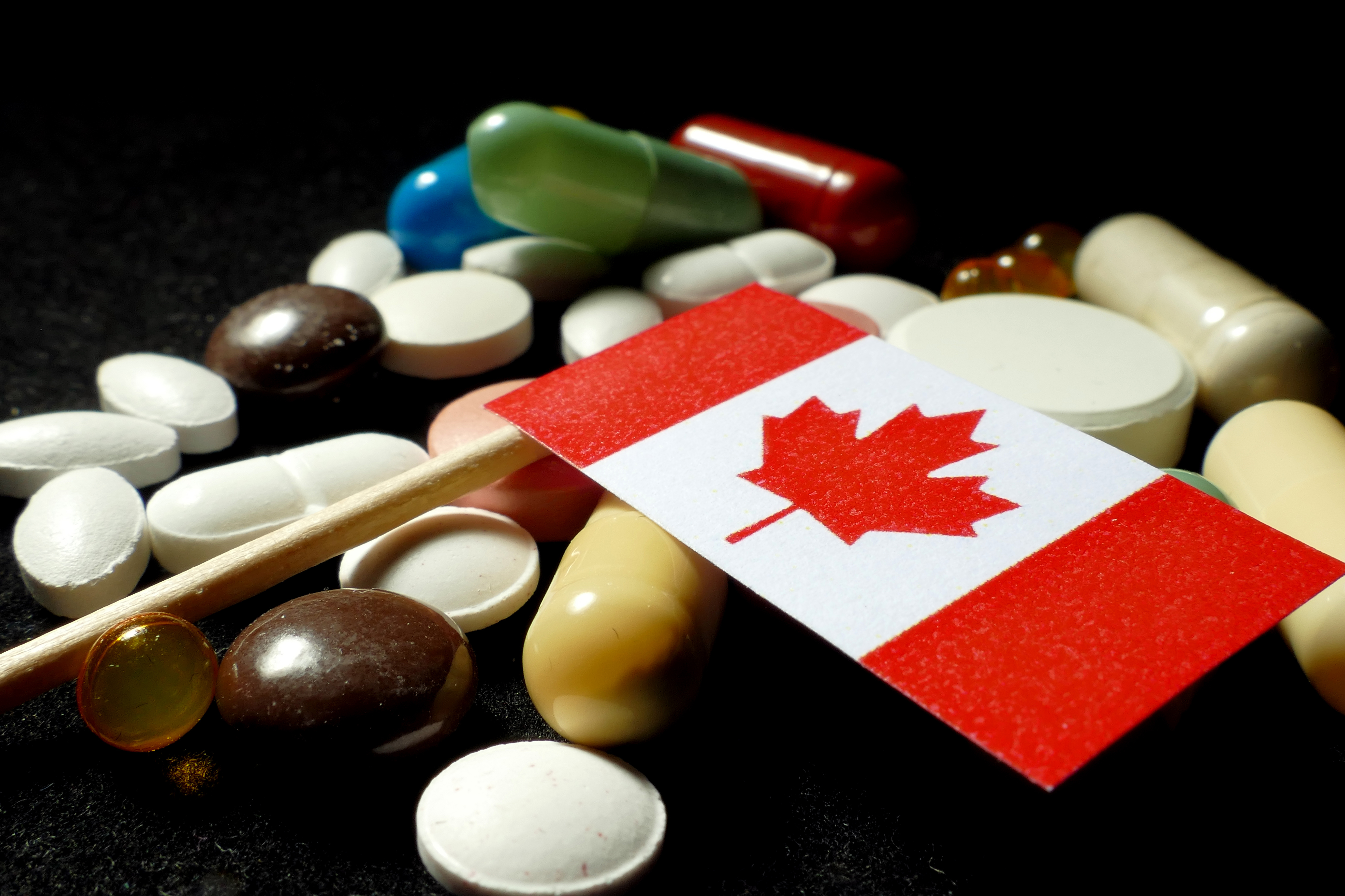 Canadian flag with antibiotic pills