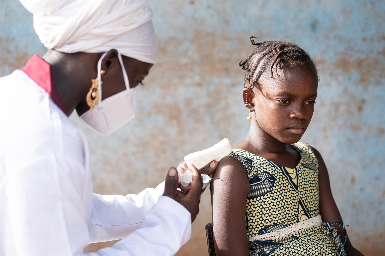 Young girl recieving vaccine