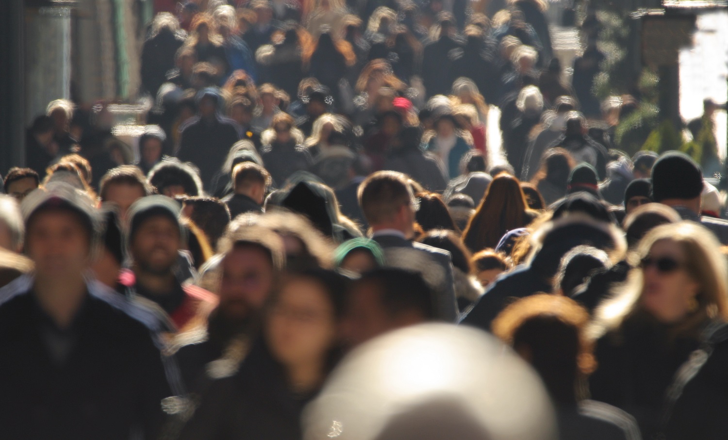 Image of people walking on a busy street