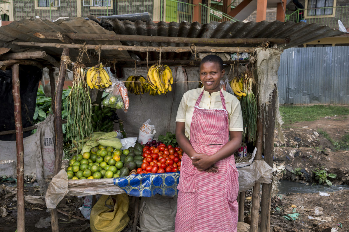 woman selling fruit in Kenya