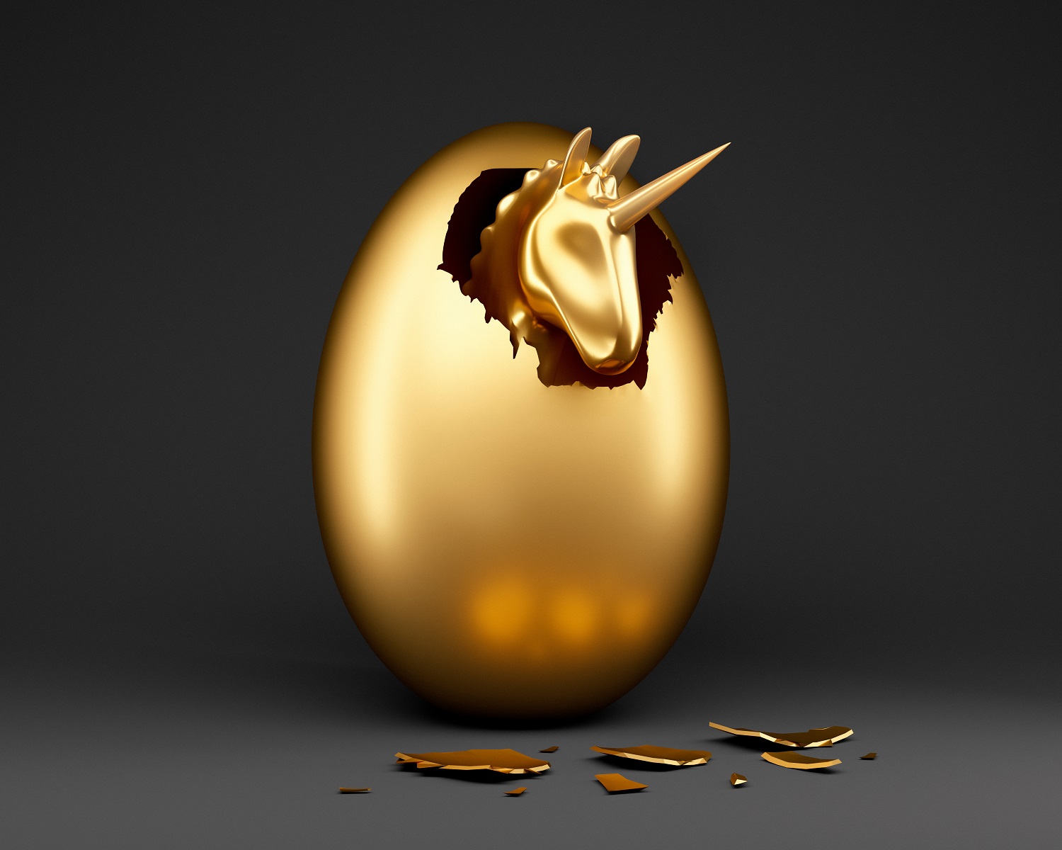 golden unicorn emerging from egg
