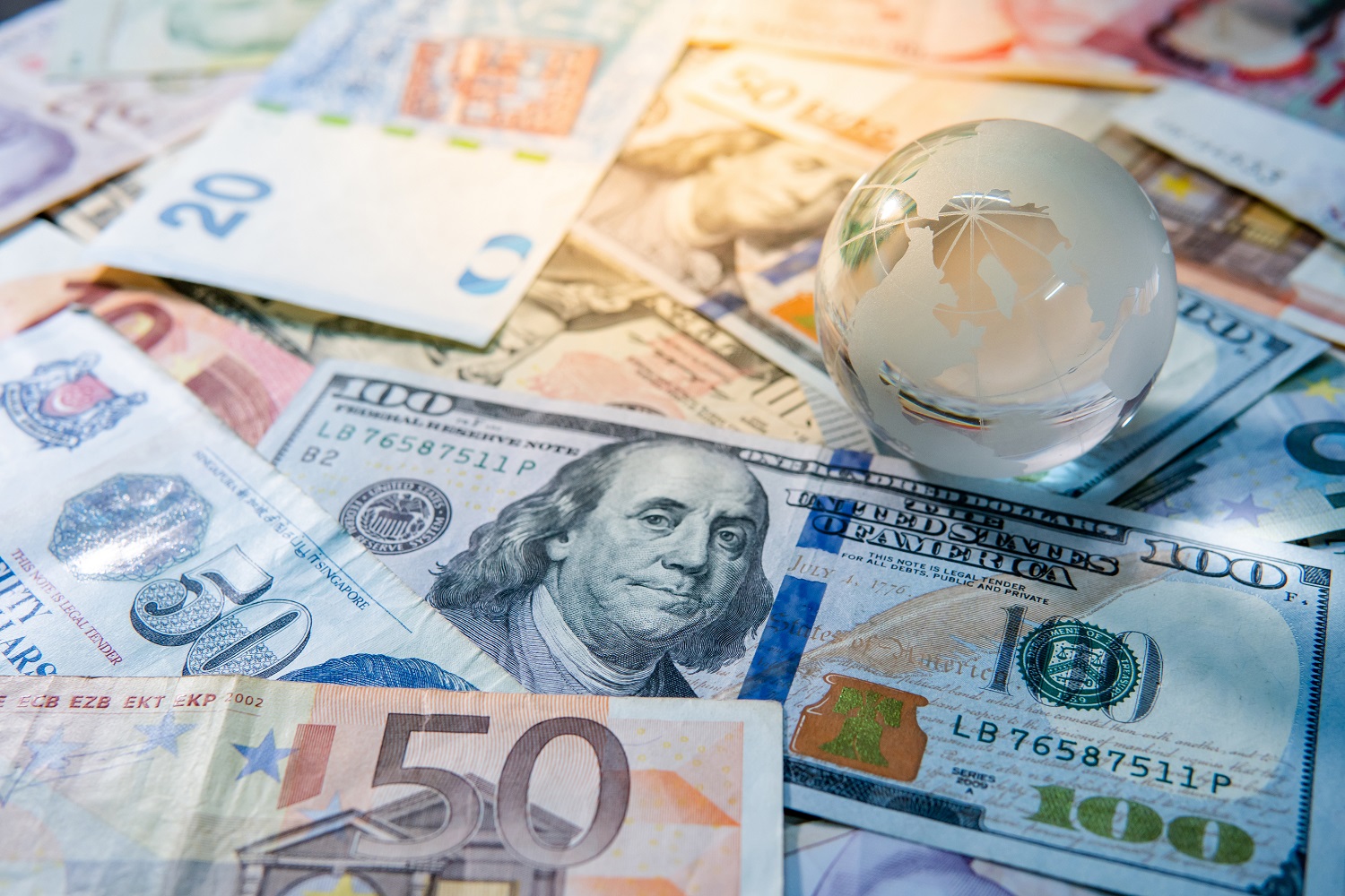 Globe and global currency 
