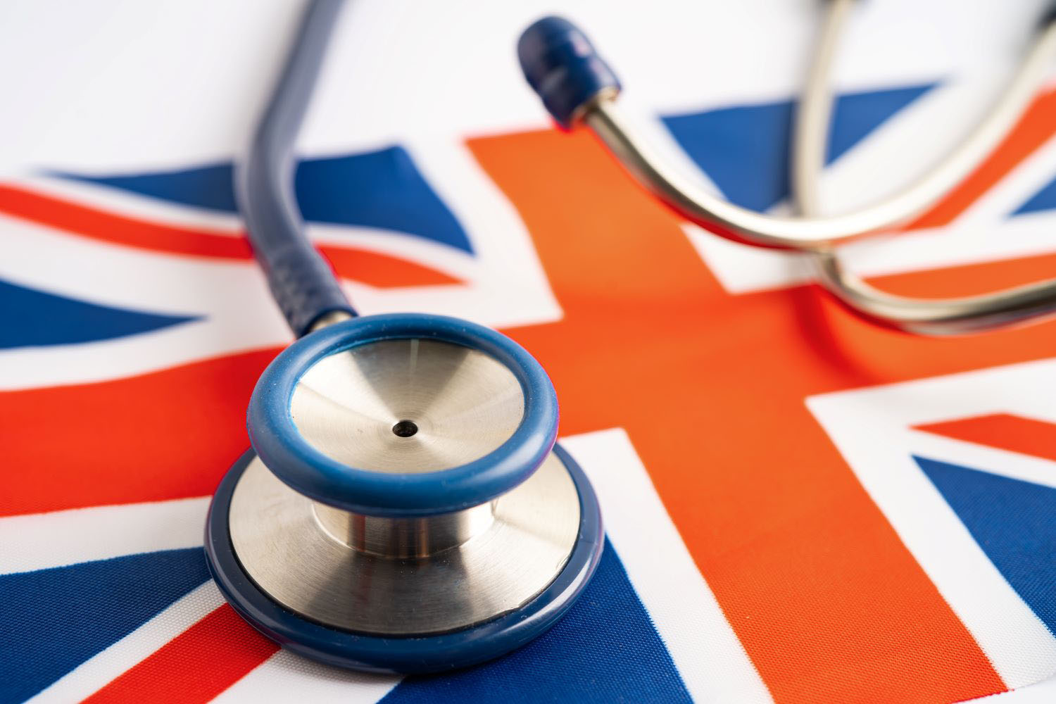 Stethoscope on United Kingdom flag background