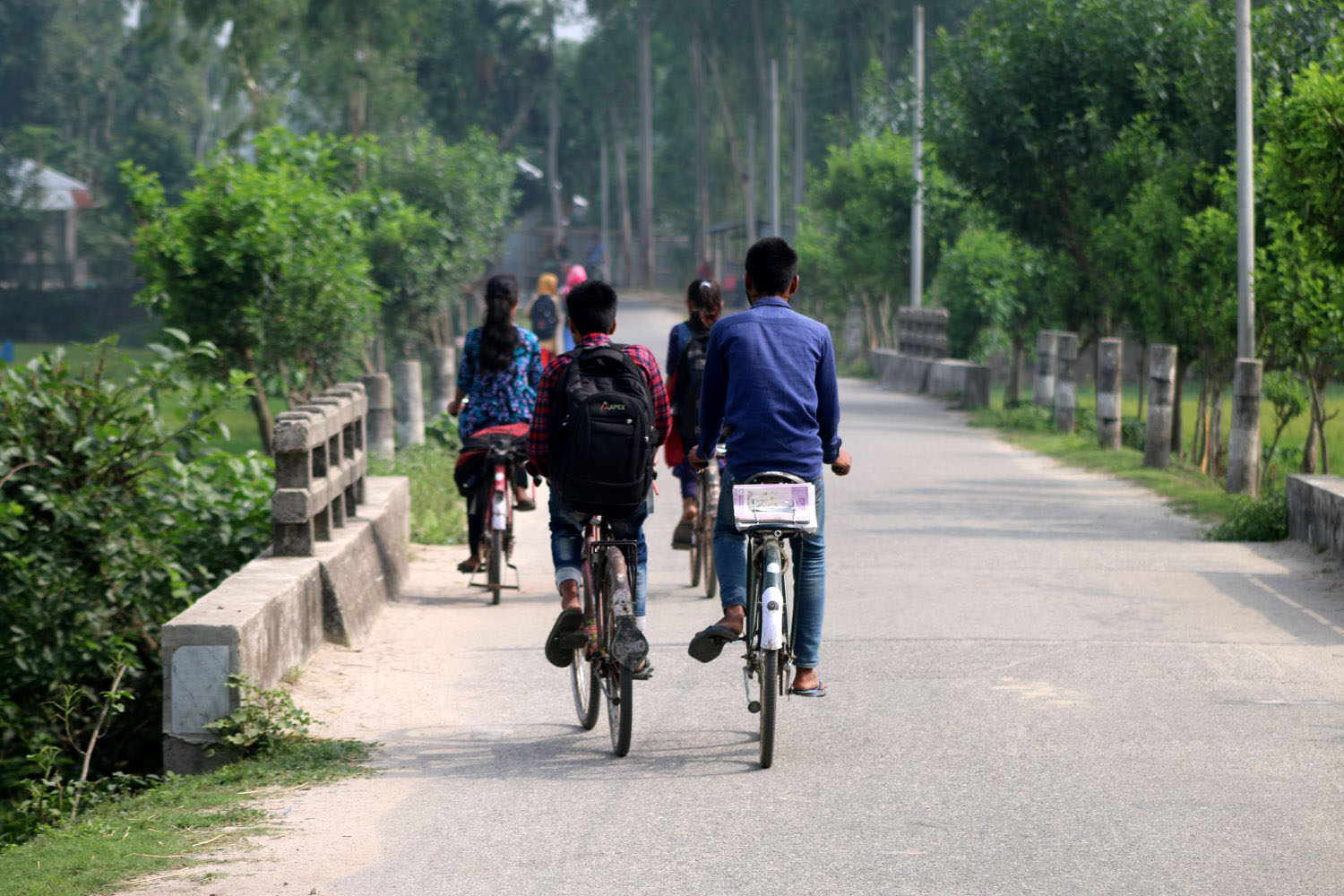 Village Students with backpack are going to school for their study 