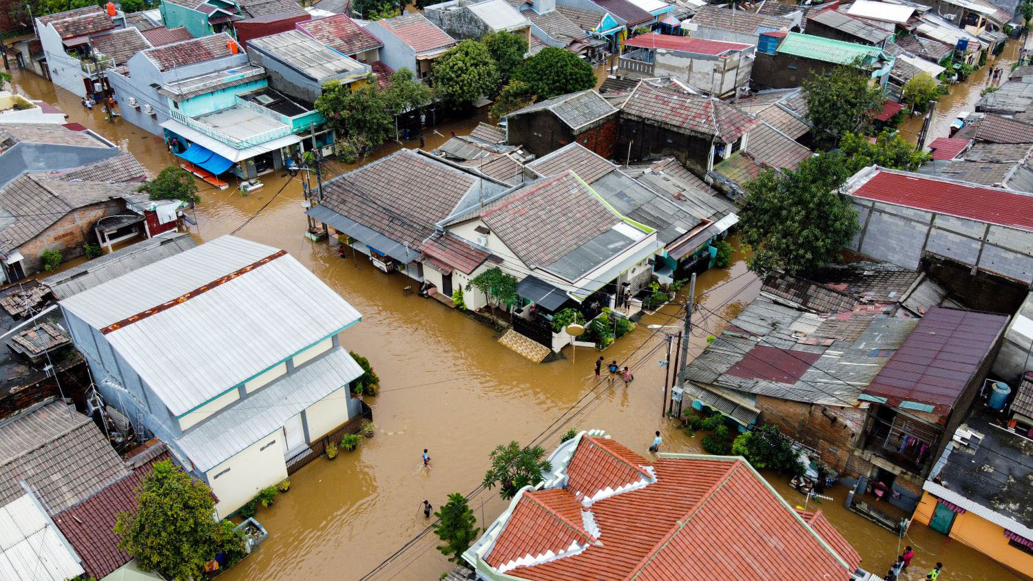 Aerial POV view Depiction of flooding. devastation wrought after massive natural disasters at Bekasi - Indonesia