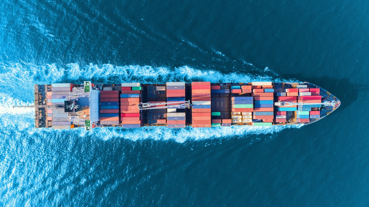 Overhead image of a cargo ship at sea