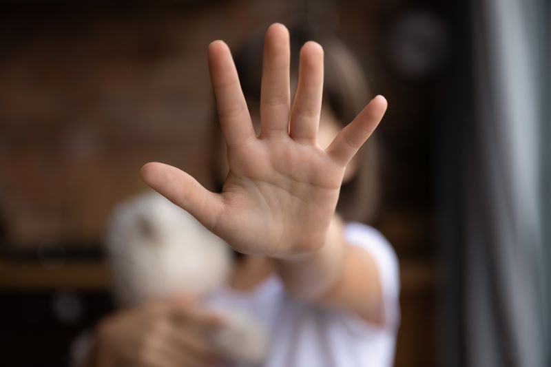 Hand of child reaching out