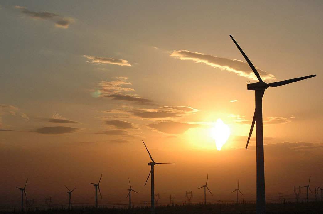 windmills at sunset