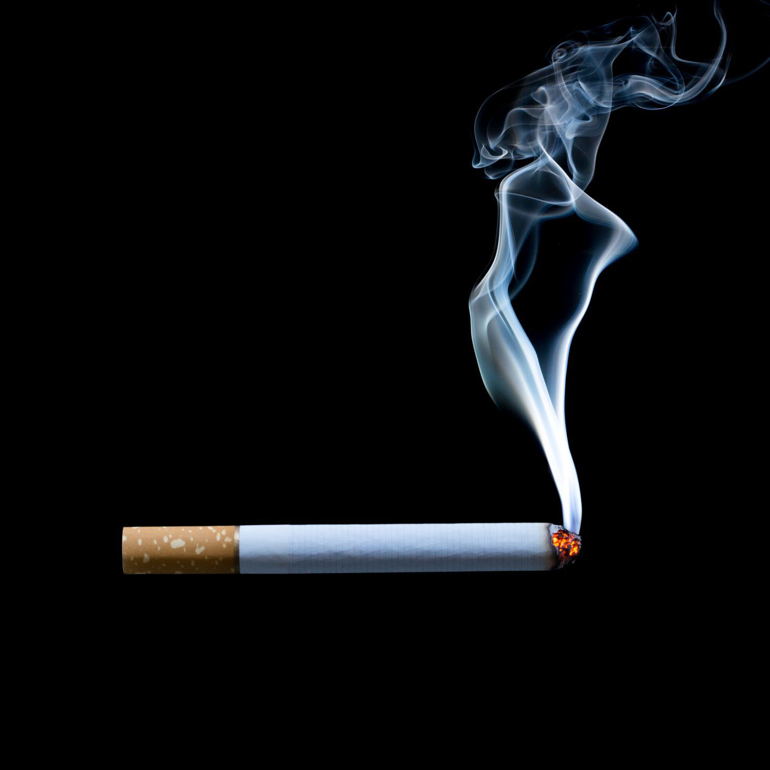 smoking cigarette on black background