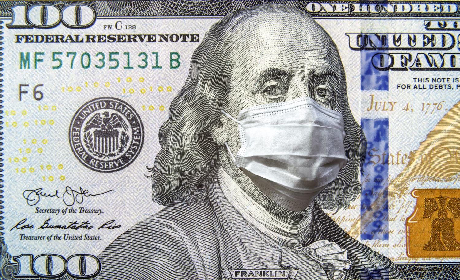 100 dollar bill and Bejamin Franklin with a mask