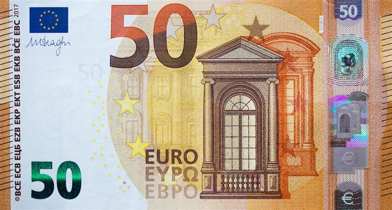 Fragment part of 50 euro banknote close up