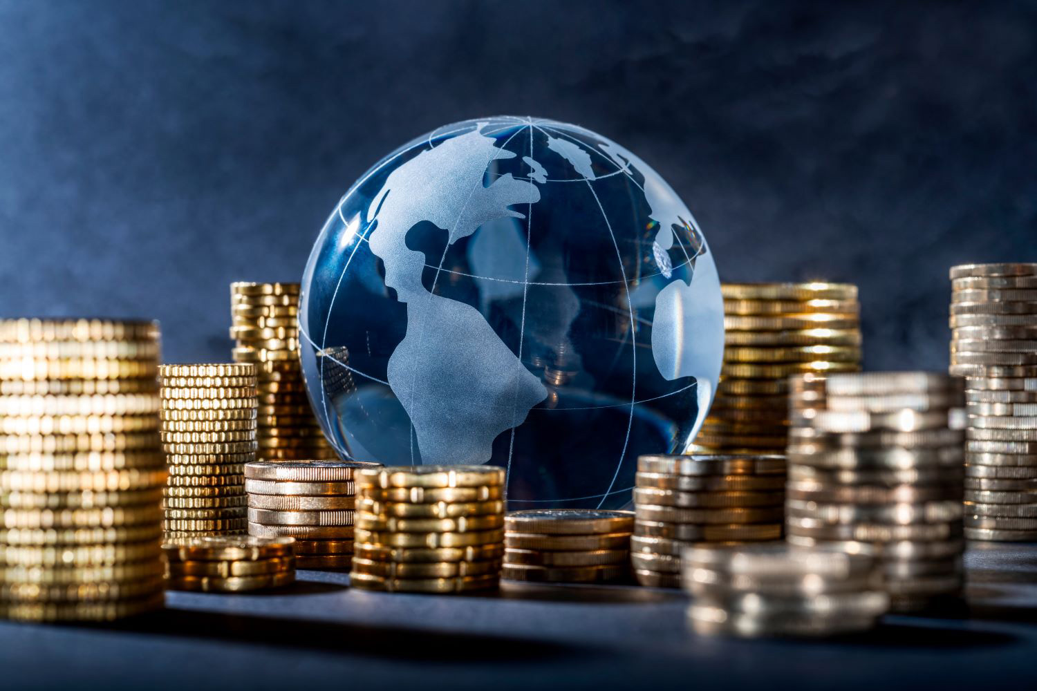 Globe and stack of coins.