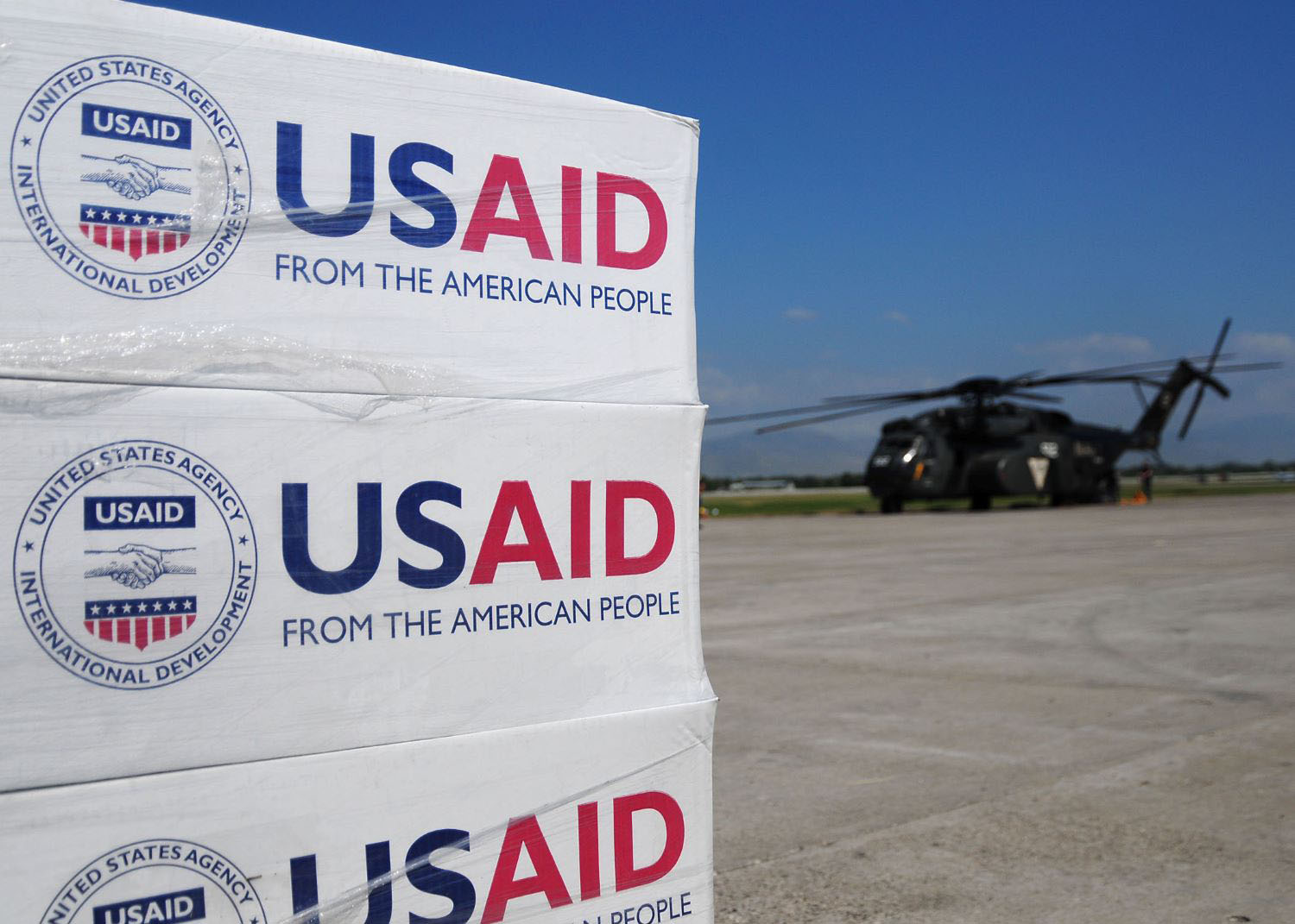 Pallets of food, water and supplies staged to be delivered
