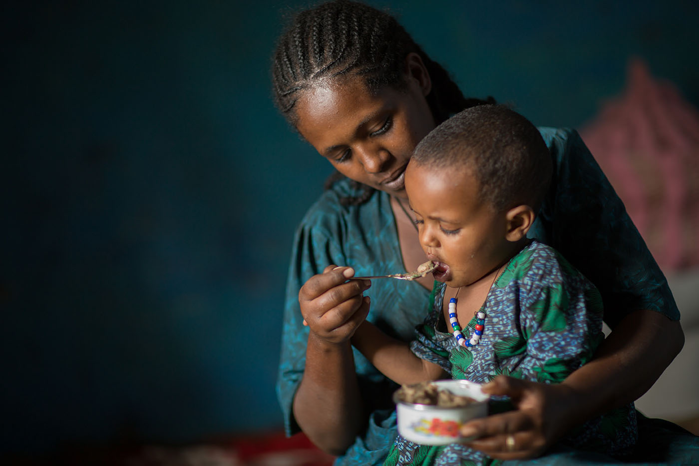 Mother in Ethiopia feeding her child