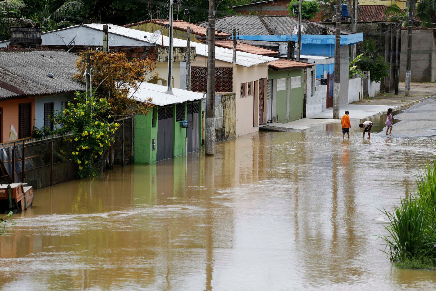 Aerial view of a big flood in a residential neighborhood of Juquia city, Ribeira valley, south of Sao Paulo state, Brazil