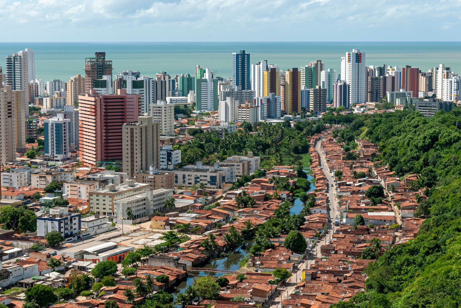  Buildings and houses showing social contrast between rich and poor people