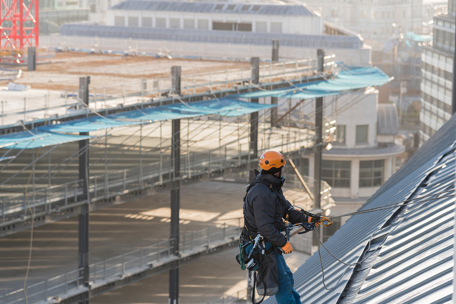 Roofer on rooftop in London