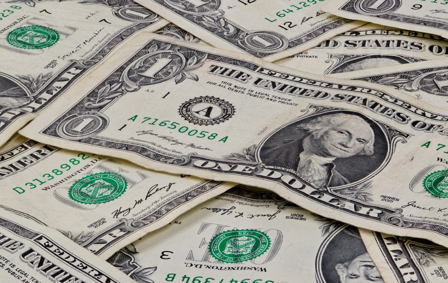 Pile of used US dollars