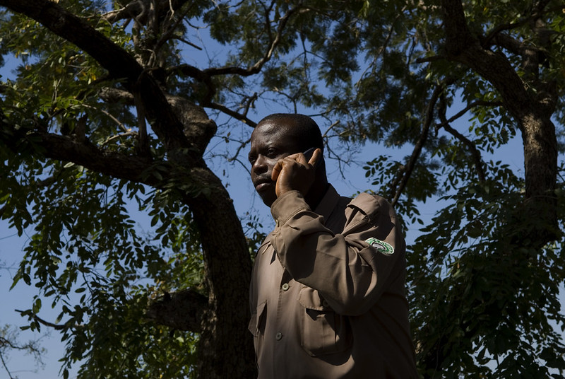 Man on phone in Ghana