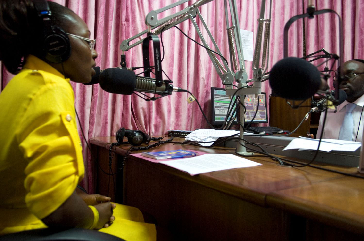 Picture of a morning radio show host at a studio in Accra, Ghana