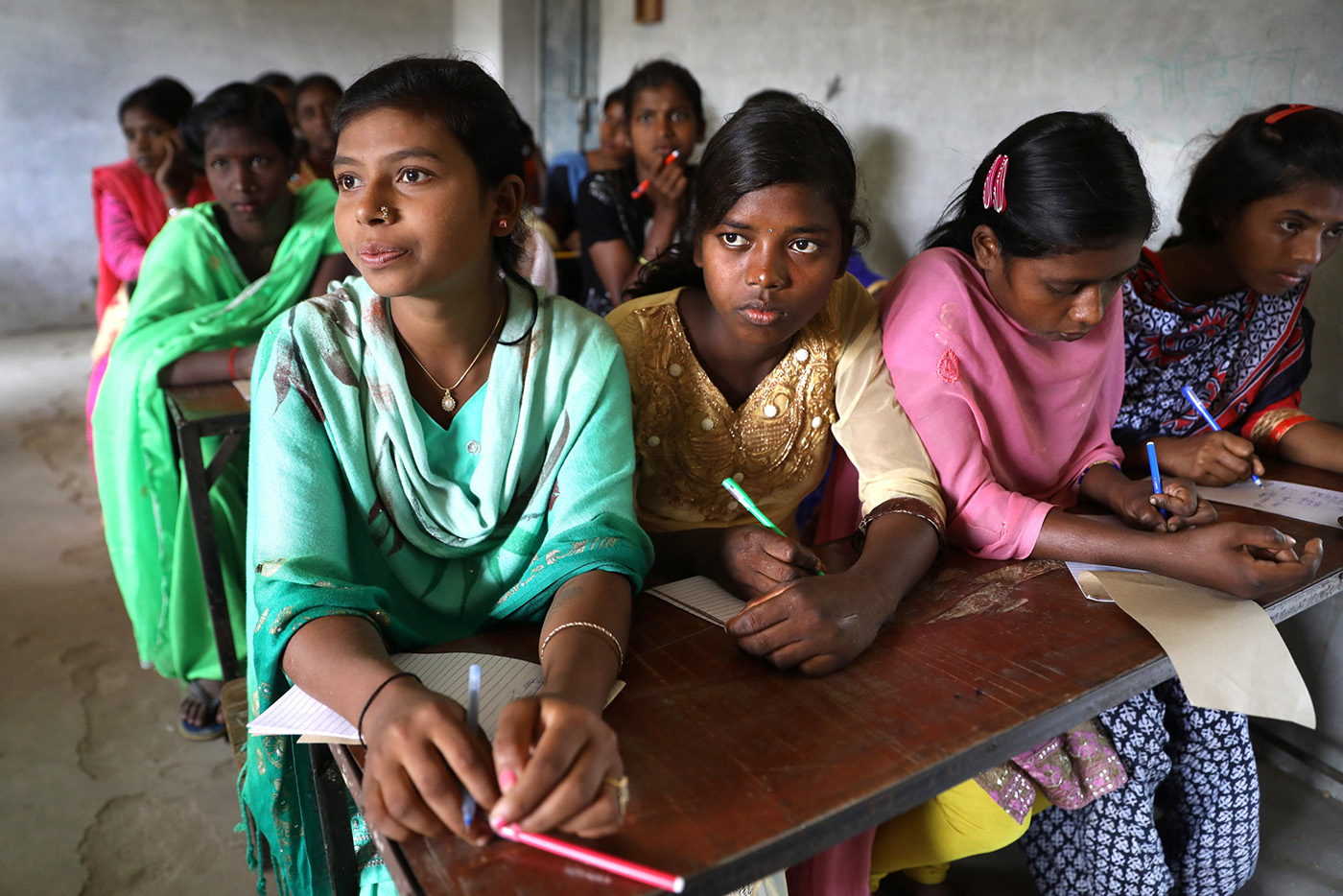 Adolescent girls at community center meeting, India