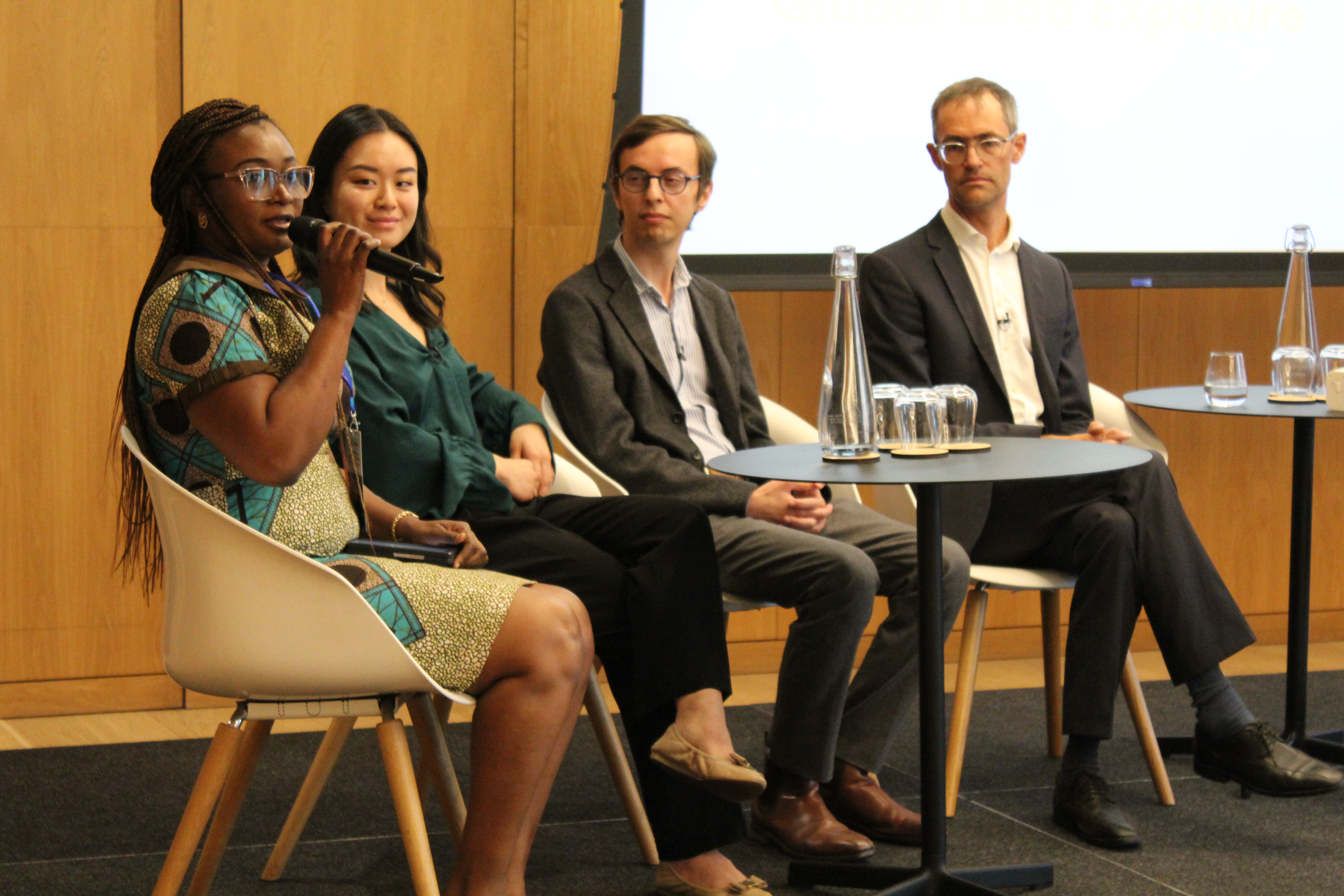 Photograph of a panel discussion at CGD's conference on global lead exposure