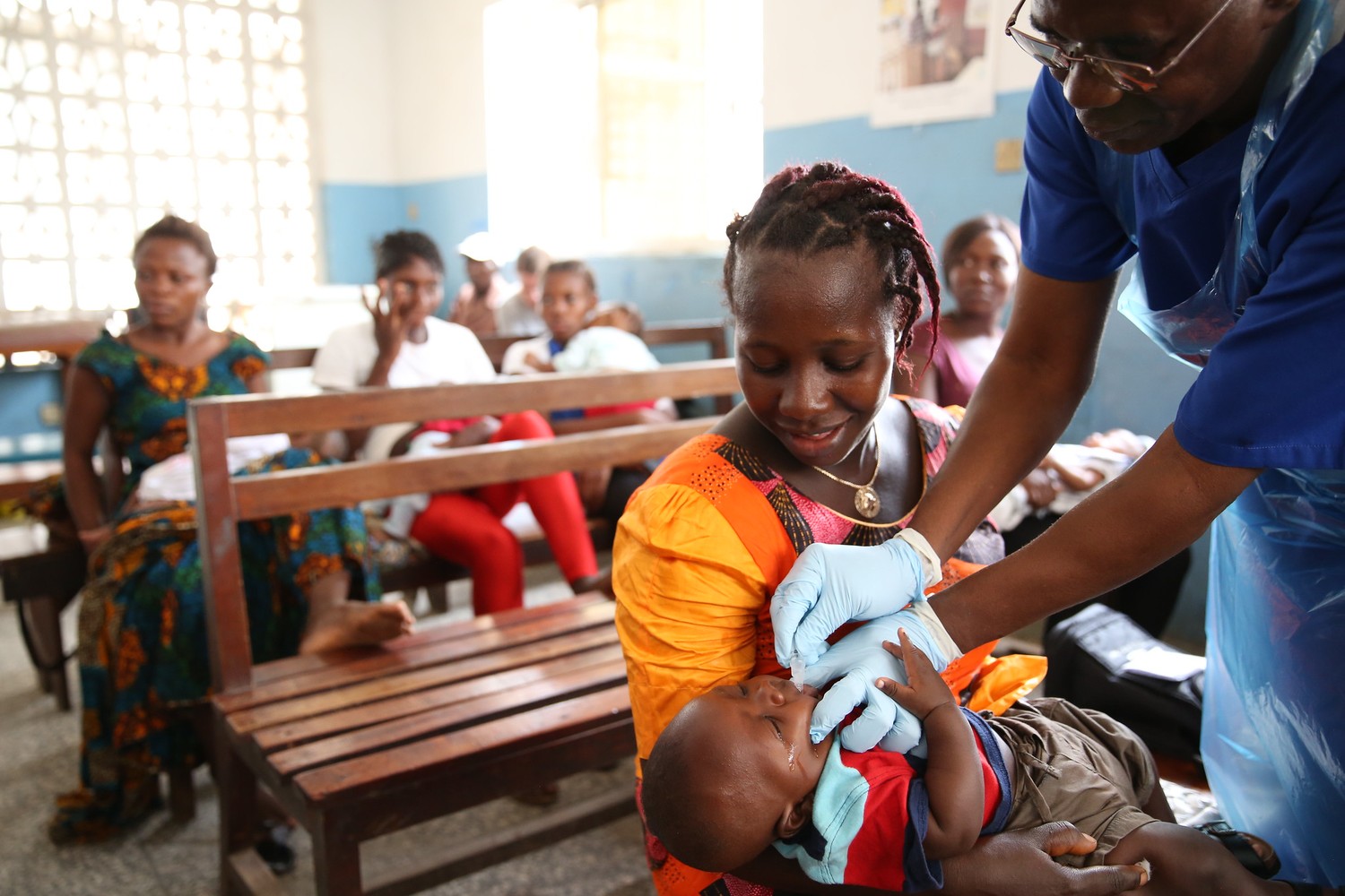 Child getting a vaccine at Ola During Children's Hospital in Freetown, Sierra Leone