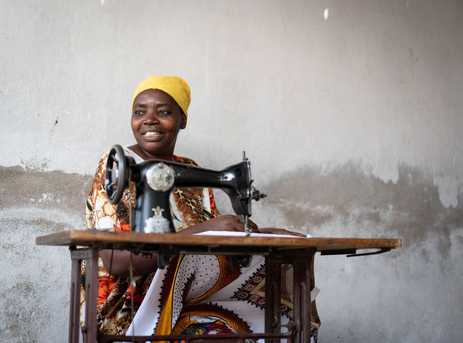 Tailor creating a garment on a sewing machine