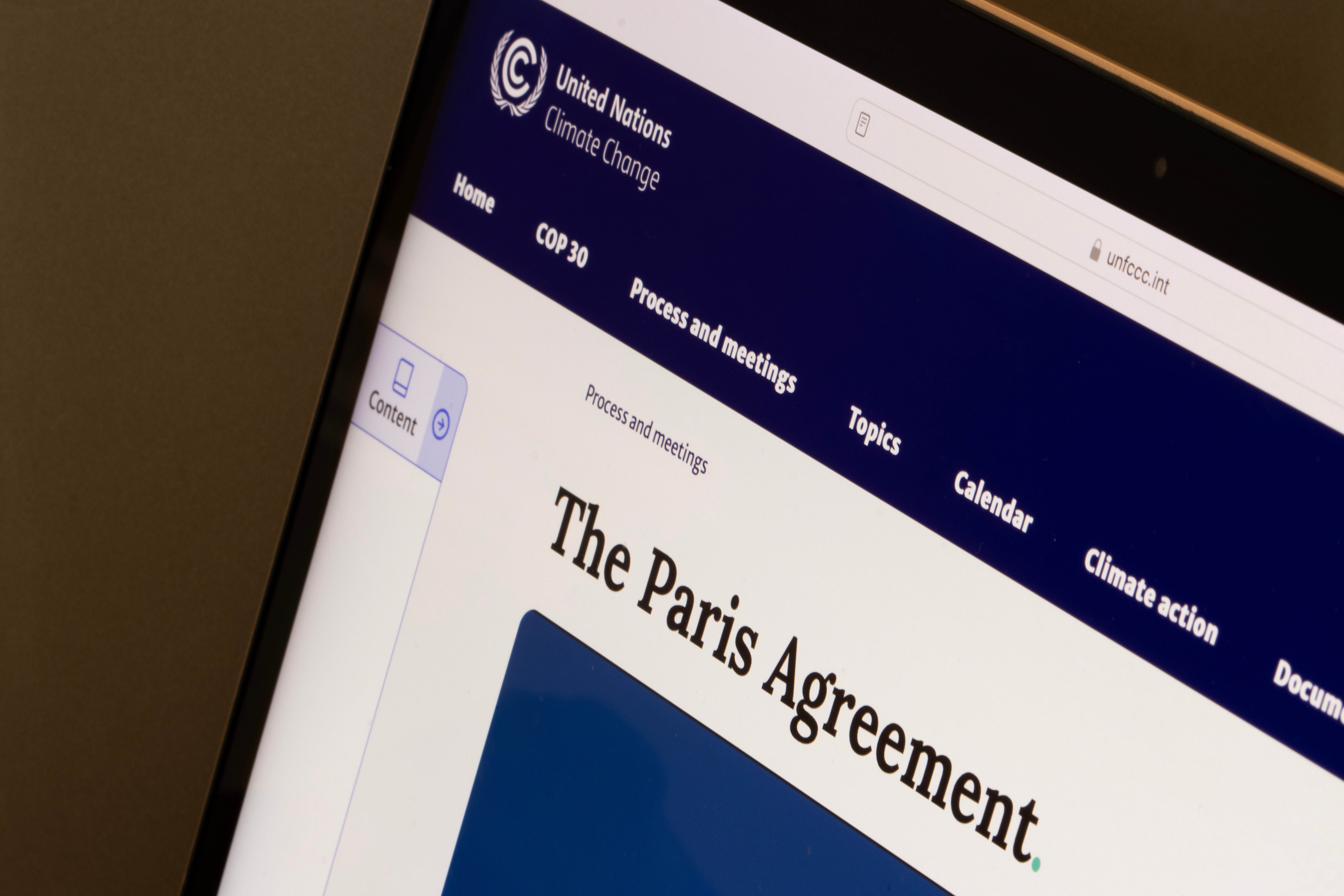 Webpage of the Paris Agreement, a legally binding international treaty on climate change, is seen on the United Nations Framework Convention on Climate Change website