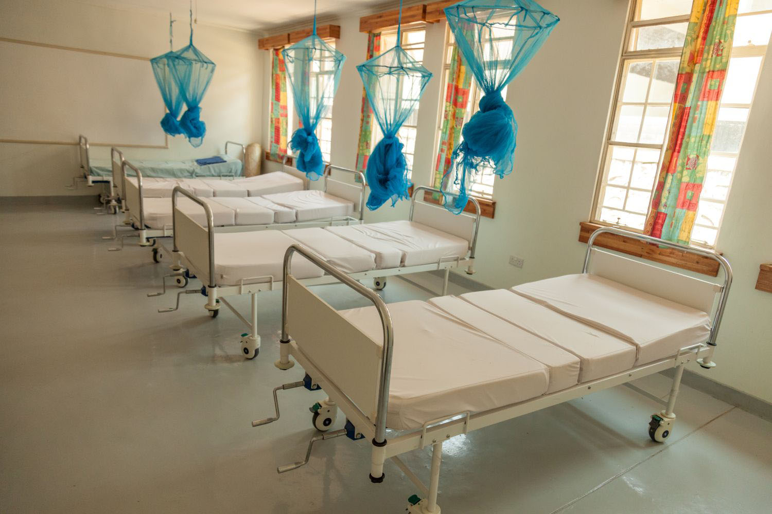 Hospital beds inside a clinic.