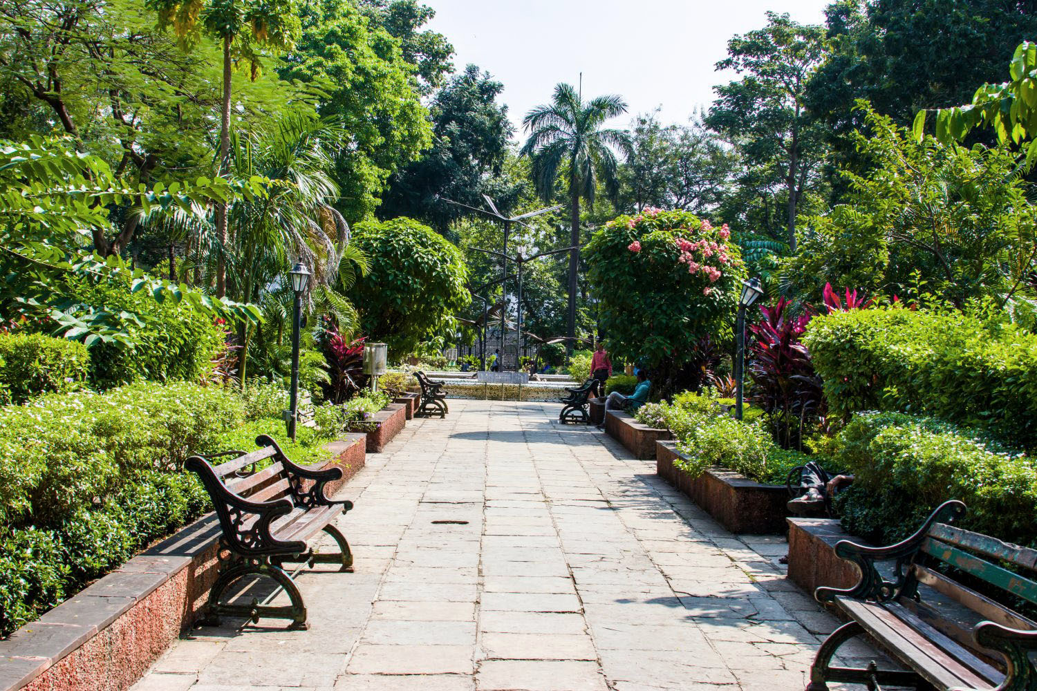 Image of a large open green park in India