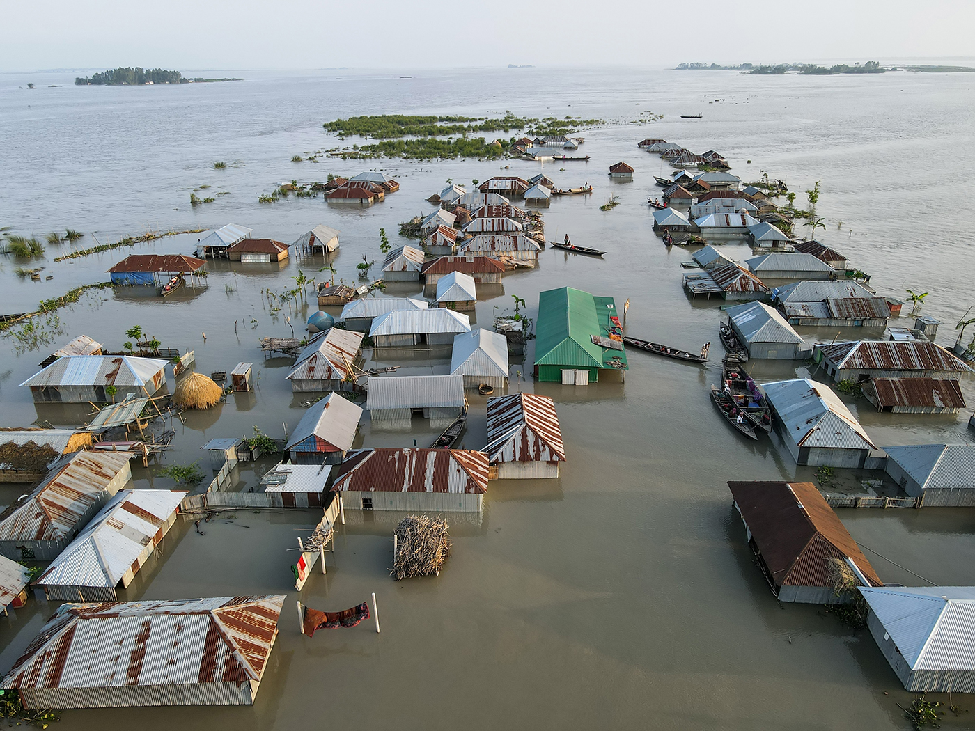 A damaged, submerged area is seen after flash floods in Sunamganj, Bangladesh