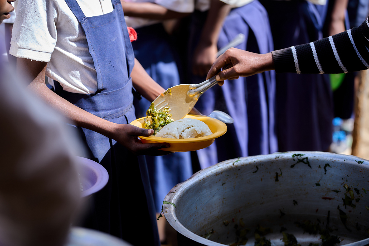 Children waiting to be served lunch