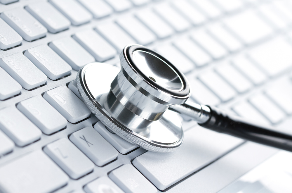 Stock photo of a stethoscope on a keyboard