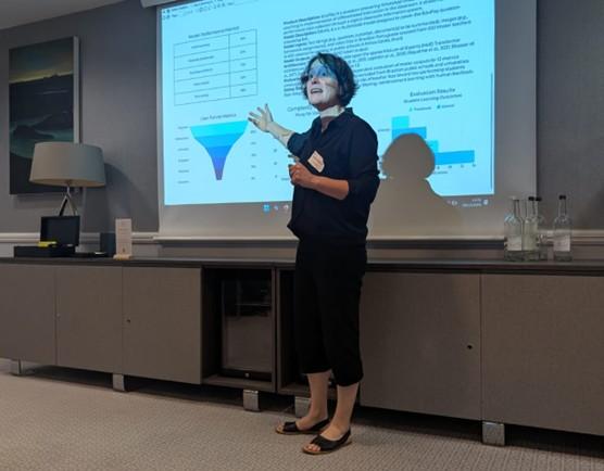 Working group co-chair Temina Madon presenting on how to evaluate user engagement